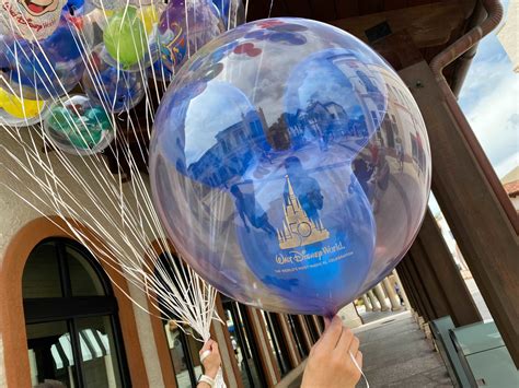 Photos Blue Earidescent Th Anniversary Mickey Balloon Floats Into