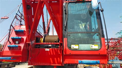 Small red crawler crane operator cabin boom anchor drum and side ...