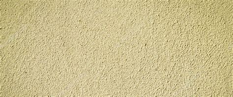 Textura De Pared De Color Beige Y Blanco Con Superficie Rugosa Yeso De