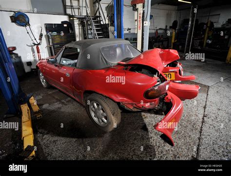 Car Wreck Crash Damaged Mk1 Mazda MX5 With The Rear Bumper Folded