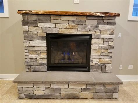 Stacked Ledgestone Natural Edge Stained Wood Mantle Logset Fireback Stone Hearth Home