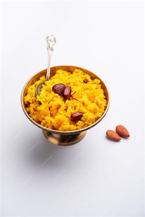 Premium Photo Badam Halwa Or Sheera Also Known As Almond Halwa Is A