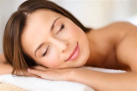 Premium Photo Beauty And Spa Concept Beautiful Woman With Closed Eyes In Spa Salon Lying On