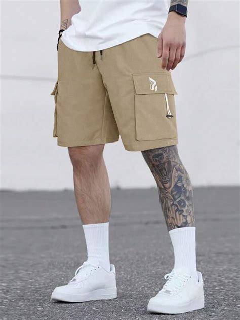 Manfinity LEGND Hombres Shorts con diseño de parche de letra con