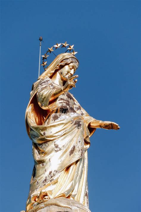 Golden Statue Of Virgin Mary · Free Stock Photo