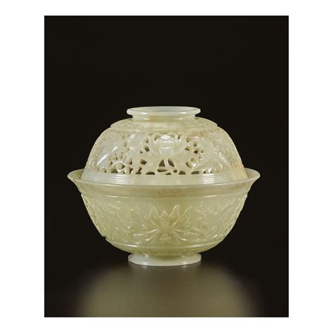 A Pale Celadon Jade Bowl And Reticulated Cover Qing Dynasty 19th