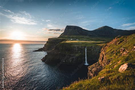 Gasadalur Village And Mulafossur Its Iconic Waterfall During Summer