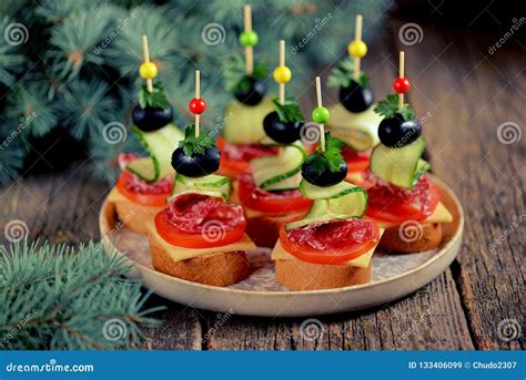 Christmas Canape On Skewer From Bread Baguette With Toast Cheese