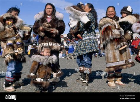 An Inuit gathering, showing traditional clothing; North Slope, Alaska ...