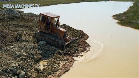 Bulldozer Mini Push Soil Gravel And Stones Cleaning The Courtyard Of