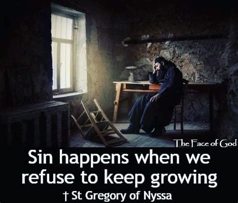 A Person Sitting At A Desk In A Dark Room With The Words Sin Happens