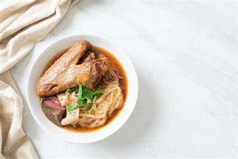 Braised duck noodles with brown soup 8638499 Stock Photo at Vecteezy