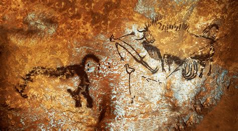 Lascaux cave painting depicts a hunter getting tackled by a bison ...