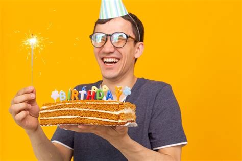 Premium Photo Portrait Of Smiling Man Holding Ice Cream