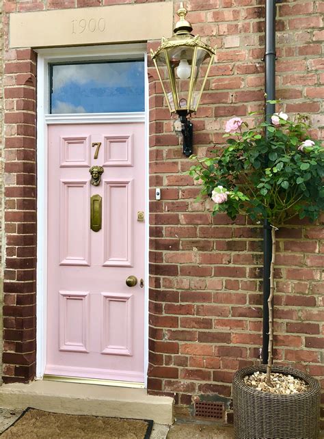 Pink Front Door On Red Brick House