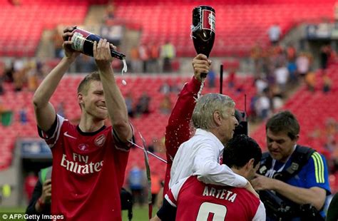 Arsene Wenger Forced To Go Topless After Arsenal Team Soak Him In Beer