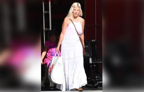 Tori Spelling Spells Trouble In These Sexy Bikini Pics