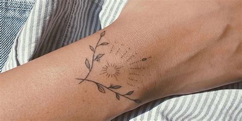 Light Brown Wrist Tattoo