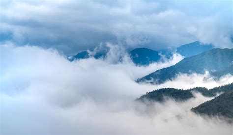 Clouds and Majestic Mountains Landscape · Free Stock Photo