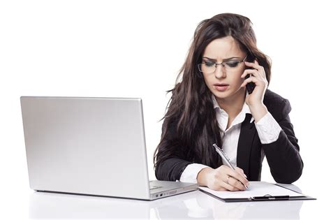 Business Woman At The Desk With A Laptop Talking On The Phone Morgan