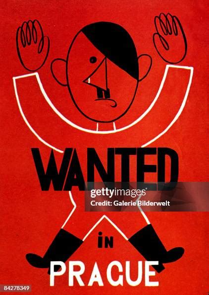 A World War Ii Poster Featuring Adolf Hitler With His Arms Raised And