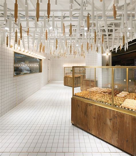 Rolling Pins Hang From Ceiling Inside Beijing Bakery By B L U E