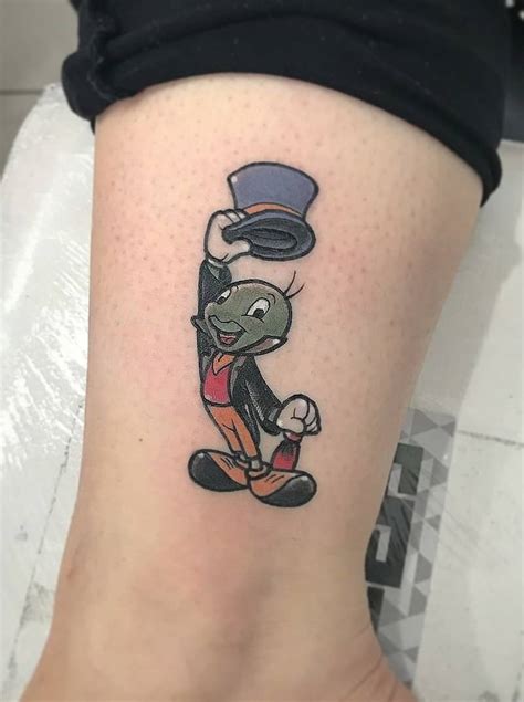 Cartoon Character Tattoo On Lower Leg Blurmark