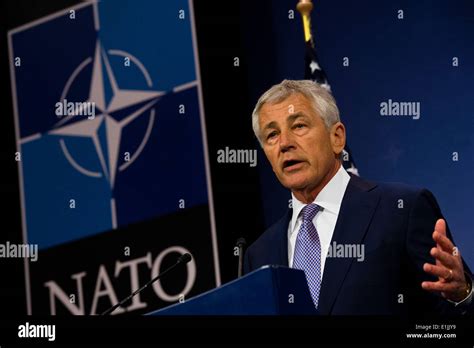 Secretary Of Defense Chuck Hagel Talks To Reporters During A Press