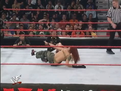 Trish Stratus in the first bra and panties match : r/WrestleGirls