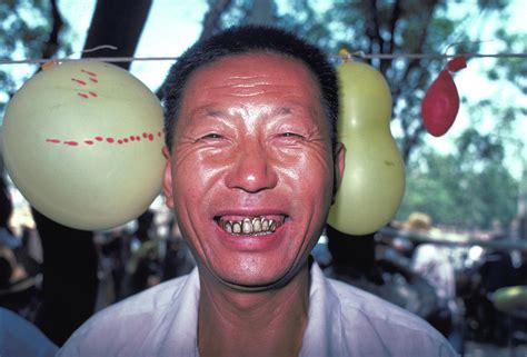 Man with Gold Teeth in China Photograph by Carl Purcell - Fine Art America