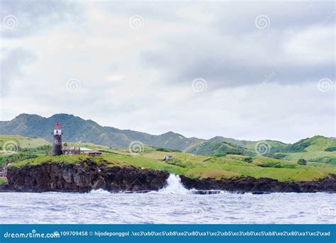 Hills of Sabtang Island with Lighthouse Fronting the Shore at, Batanes ...