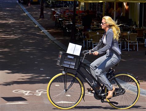 Dutch Woman Commuting On Her Bicycle Amsterdam Holland Flickr