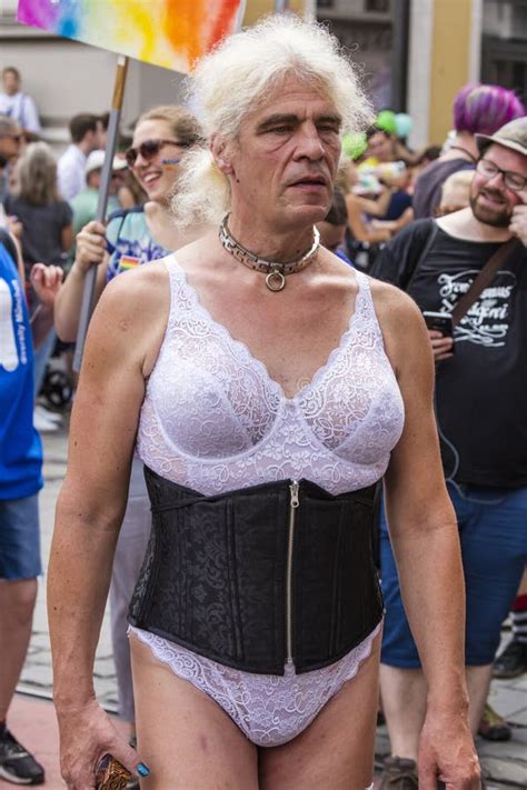 An Older Man In Corset And Underwear Attending The Gay Pride Parade