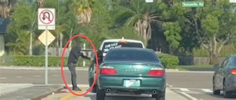 Video Shows Man With Machine Gun Allegedly Carjacking Womans Suv In