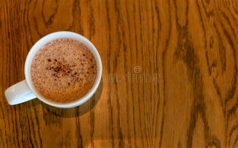 Top View Of Hot Cocoa On Wooden Table In Coffee Cafe Copy Space For Adding Text Stock Photo