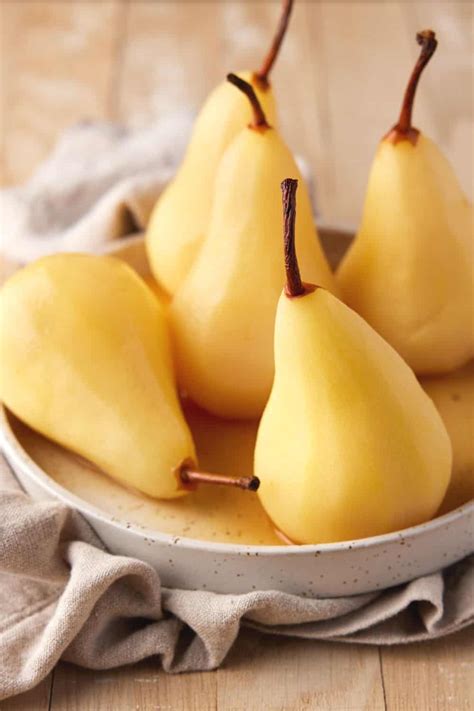 Easy Poached Pears Recipe Garnish With Lemon