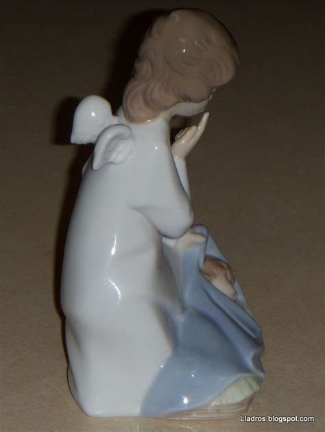 Lladros Lladro Daisa Figurine Angel With Sleeping Baby 4635