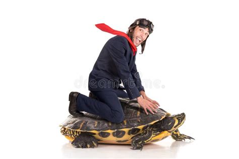 Man Riding Turtle Stock Photos Free And Royalty Free Stock Photos From