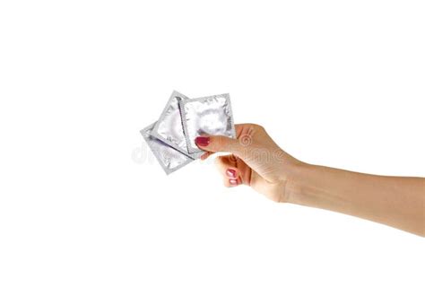 Girl`s Hand Holding Three Condoms Close Up Stock Image Image Of