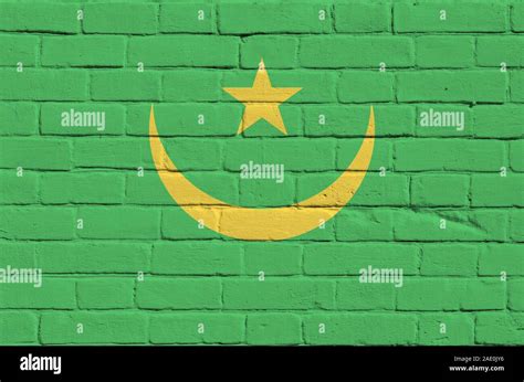 Mauritania Flag Depicted In Paint Colors On Old Brick Wall Close Up