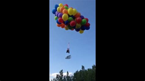 Calgary Man Takes Off In Lawn Chair Suspended By Balloons Youtube