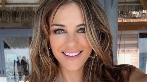 Elizabeth Hurley 58 Impresses In Swimwear As Beach Bombshell