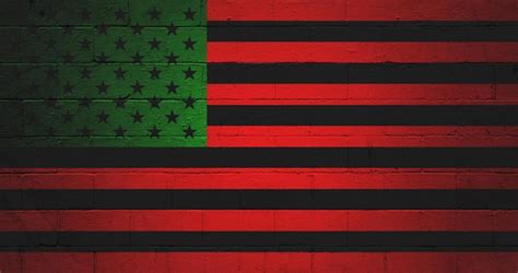 Premium Photo Flag Of The African American Painted On A Wall