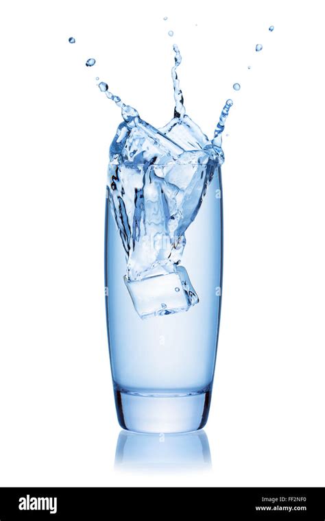 Ice Cube Splashing Into A Glass Of Water Isolated On The White Background Clipping Path