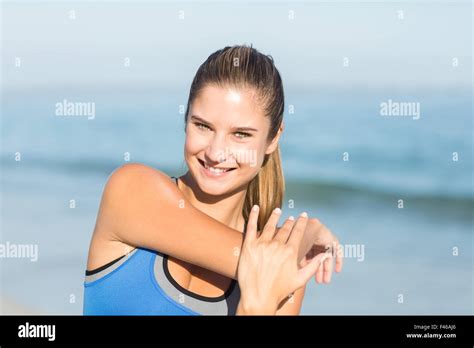 Beautiful Fit Woman Stretching Her Arm Stock Photo Alamy