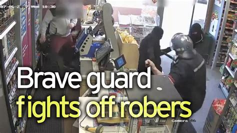 Heroic Security Guards Chase Armed Robbers Out Of Shop During