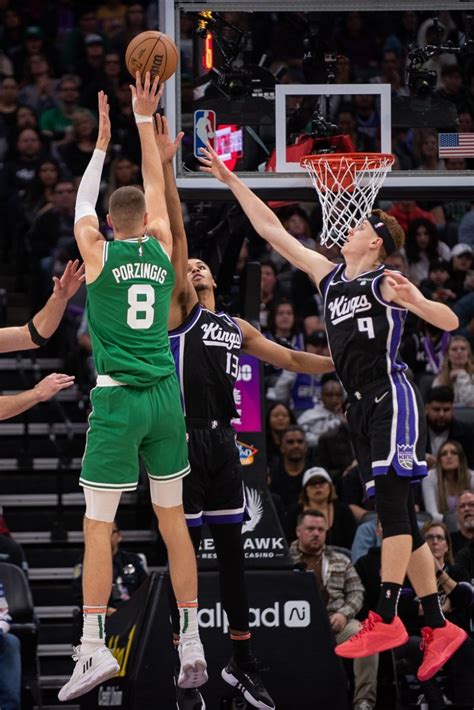 Boston Celtics Center Kristaps Porzingis 8 Takes A Shot Over Sacramento Kings Forward Keegan