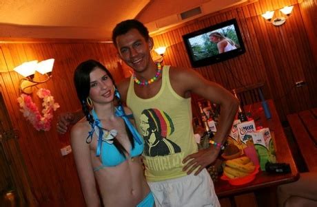 Horny College Students Partake In Group Sex During A Hawaiian Themed Party PornPics