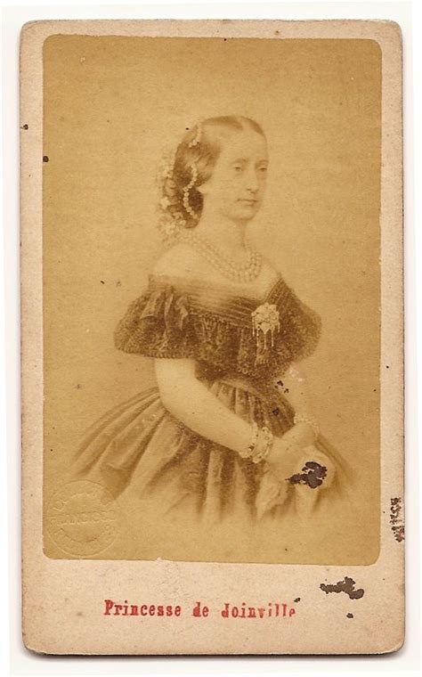 An Old Photo Of A Woman In A Dress