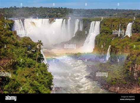 Rainbow and Iguazu Falls. Iguazu Falls are waterfalls of the Iguazu ...